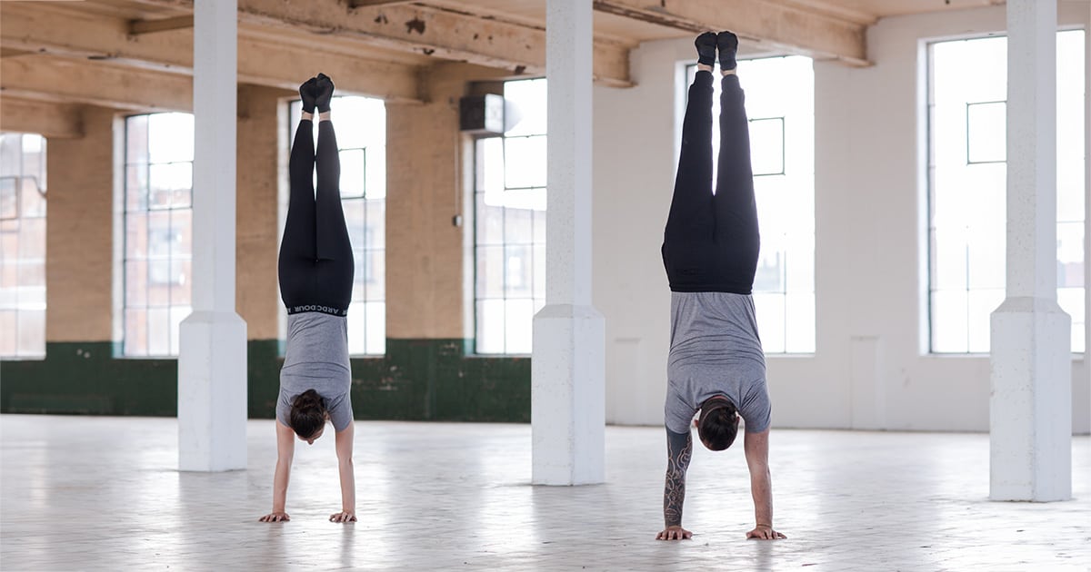 Handbalancers demonstrating a straight handstand